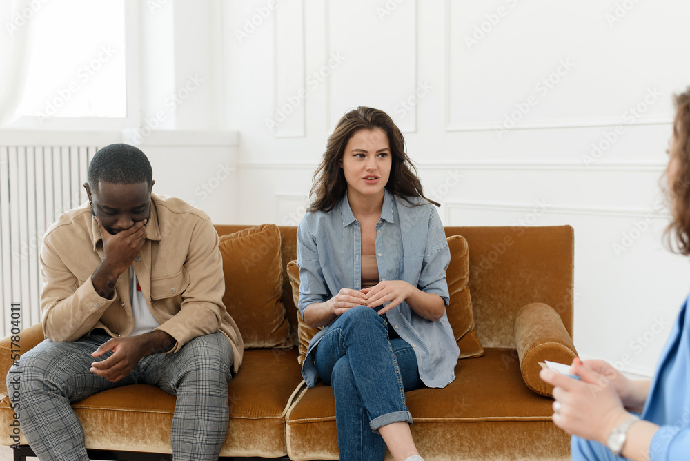 A diverse couple came to a session with a psychologist. Relationship problems, avoiding divorce A diverse couple came to a session with a psychologist. Relationship problems, avoiding divorce
