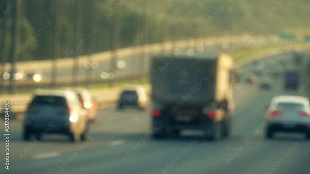 Busy highway traffic in summer, slow motion bokeh video Busy highway traffic in summer, slow motion bokeh video
