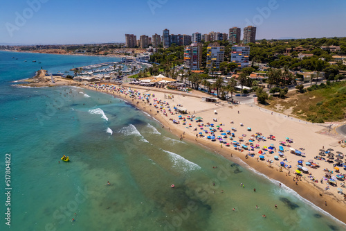 Aerial view of Dehesa de Campoamor beach, Alicante during sunny summer day. Costa Blanca. Spain. Travel and tourism concept.