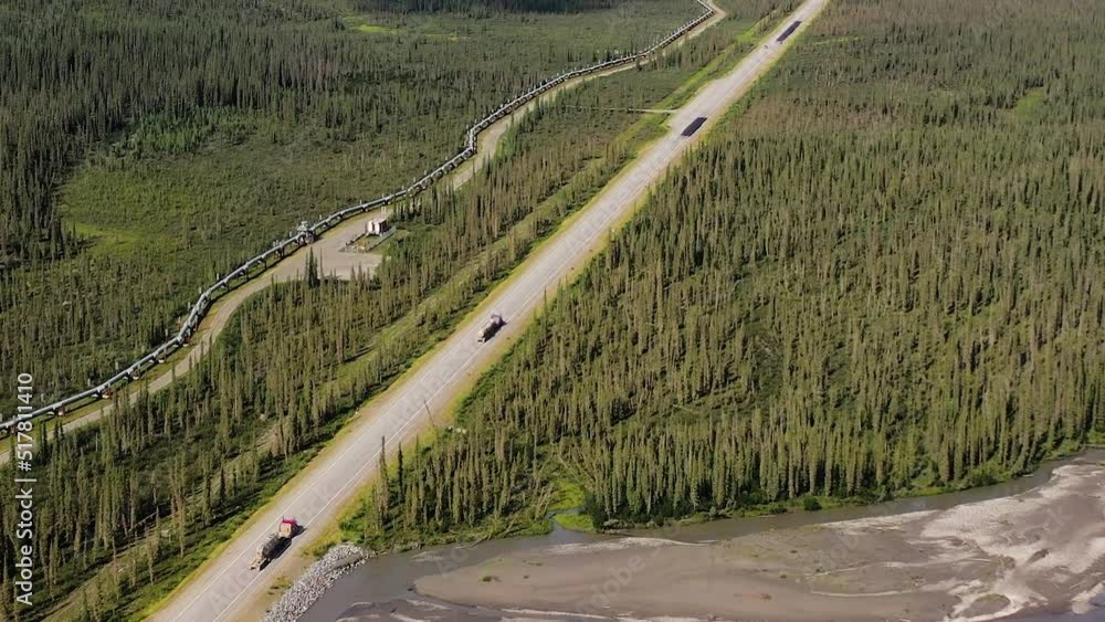 Diesel Tank Trucks driving Portage Glacier road in Alaska, Metal chrome