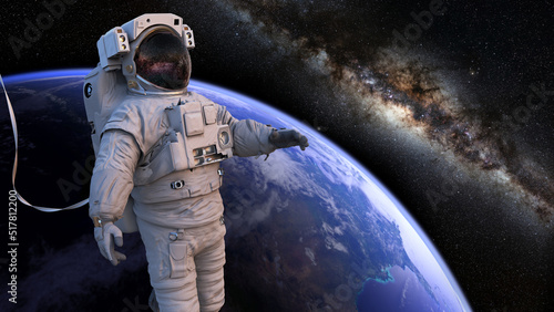 Fototapeta Naklejka Na Ścianę i Meble -  astronaut during spacewalk in Earth orbit  