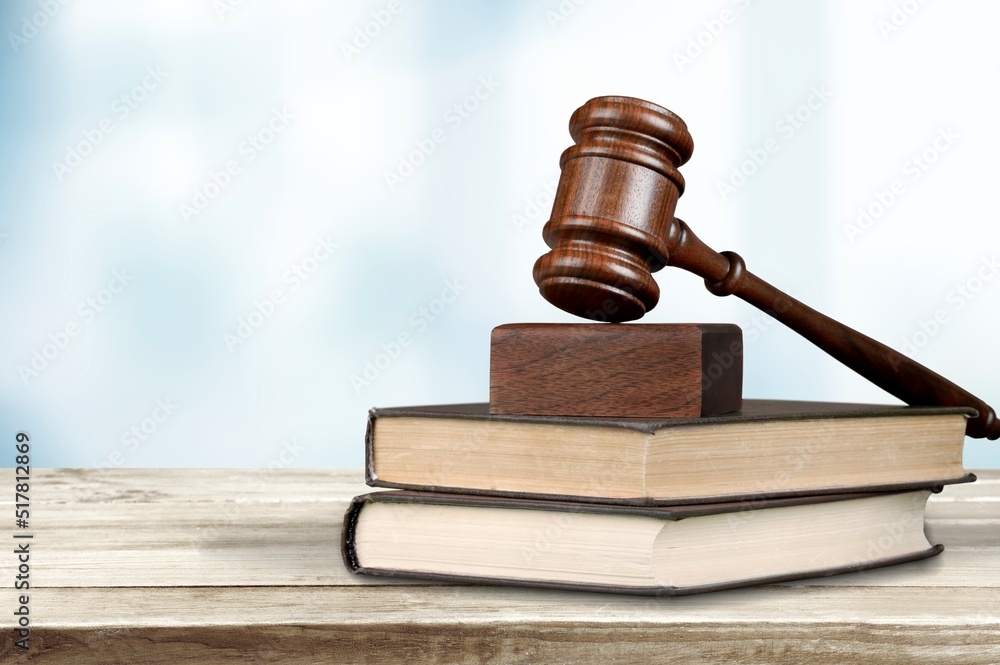 Judge gavel on law books in court, law and justice concept. Judge gavel on law books in court, law and justice concept.