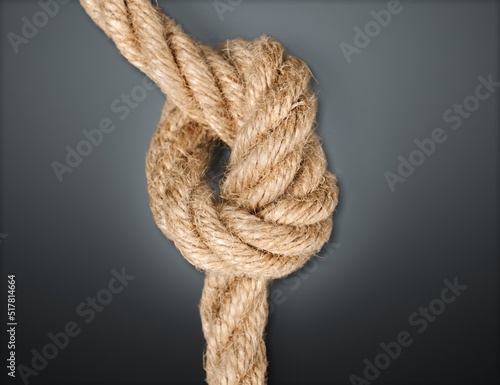 The form of a rope knot. Knot tightening. The concept of strong love and inextricable relationship. photo