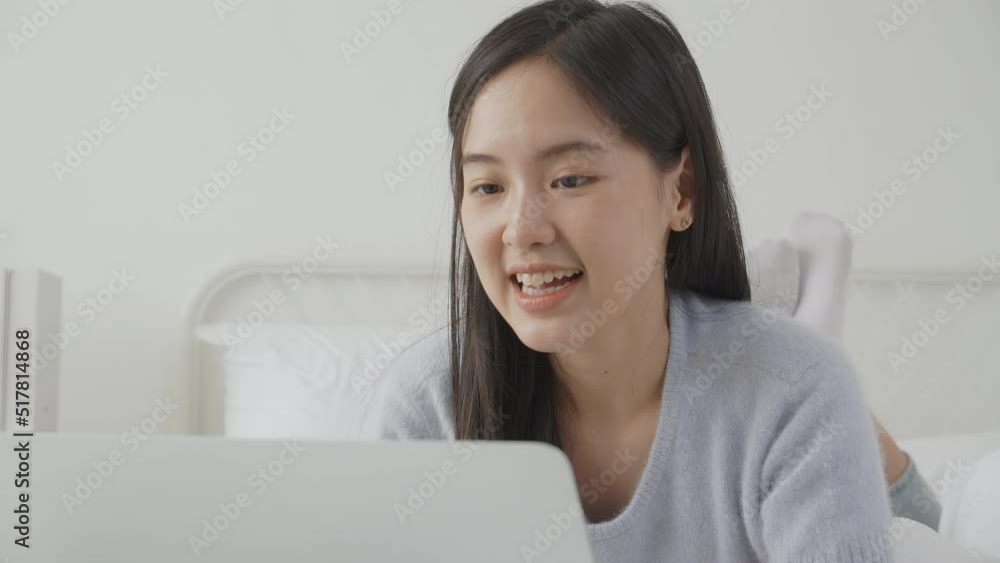 Young asian woman using laptop computer for video conference online with friends, businesswoman working with video call for meeting with social network, business and communication concept. Young asian woman using laptop computer for video conference online with friends, businesswoman working with video call for meeting with social network, business and communication concept.
