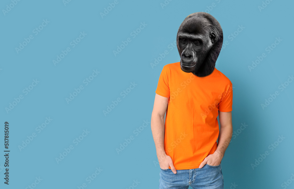 Man with head of gorilla on blue background Man with head of gorilla on blue background