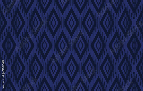 Traditional tribal or Modern native ikat pattern. Geometric ethnic background for pattern seamless design or wallpaper. © NaphakStudio