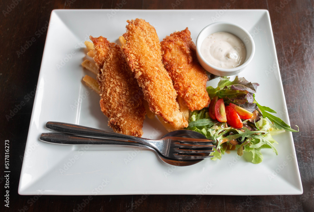 deep fried fish and chips with salad and sour sauce deep fried fish and chips with salad and sour sauce