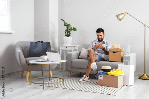 Handsome man with credit ca...