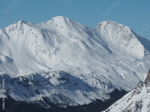 Snow covered mountains at Kicking Horse Ski Resort photo