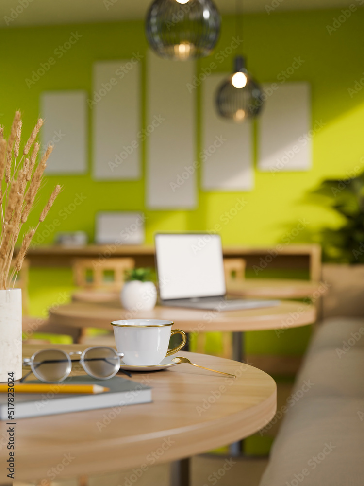 Close-up, Modern wood table with accessories in modern trendy green coffee shop seating area Close-up, Modern wood table with accessories in modern trendy green coffee shop seating area