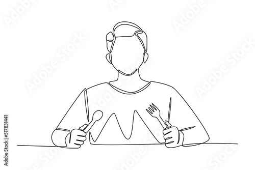 Continuous one line drawing Young boy waiting for eating. Holding a spoon and fork in the hand. Eating activity concept.  Single line draw design vector graphic illustration.