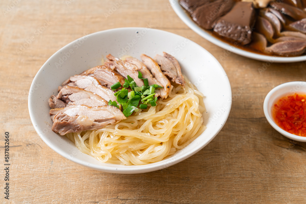 dried duck noodles in white bowl