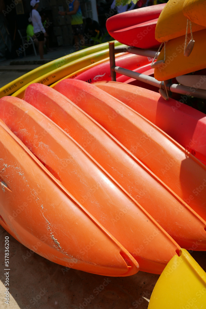 red color surfboard at the beach . red color surfboard at the beach .