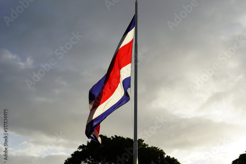 Beautiful view the Costa Rica Flag waving dramatically in the sky photo
