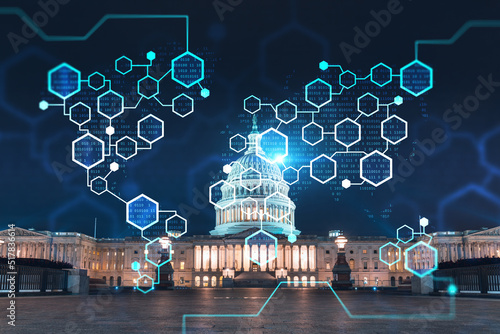 Front view, Capitol dome building at night, Washington DC, USA. Illuminated Home of Congress and Capitol Hill. Decentralized economy. Blockchain, cryptography and cryptocurrency concept, hologram photo