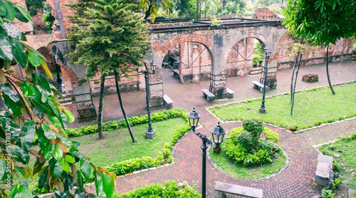 Old-world Intramuros is home to Spanish-era landmarks like Fort Santiago, with a large stone gate and a shrine to national hero José Rizal. photo