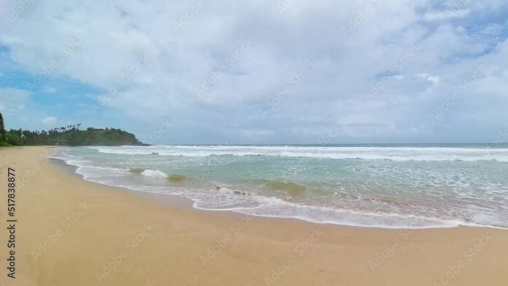 Beautiful Silent Beach, palm trees by turquoise water. Sri Lanka. Beautiful Silent Beach, palm trees by turquoise water. Sri Lanka.