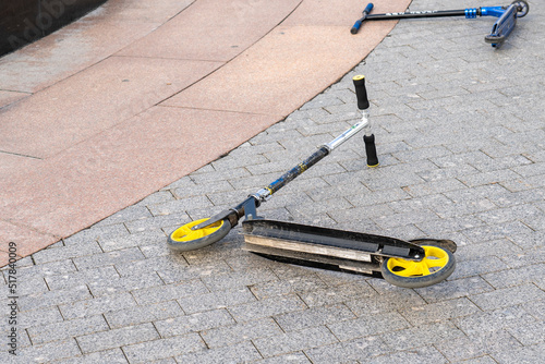 the scooter after the collision lies on the ground