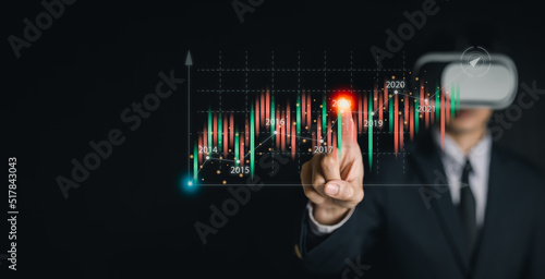 Businessman uses virtual technology in forex trading, sales data analysis and economic growth chart, stock market finance, business strategy chart and digital marketing and stock market planning.