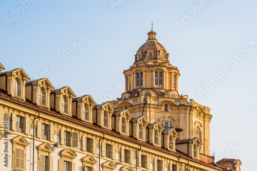 Exterior view of the Real Chiesa di San Lorenzo dome seen from Piazza Castello in Turin, Italy photo