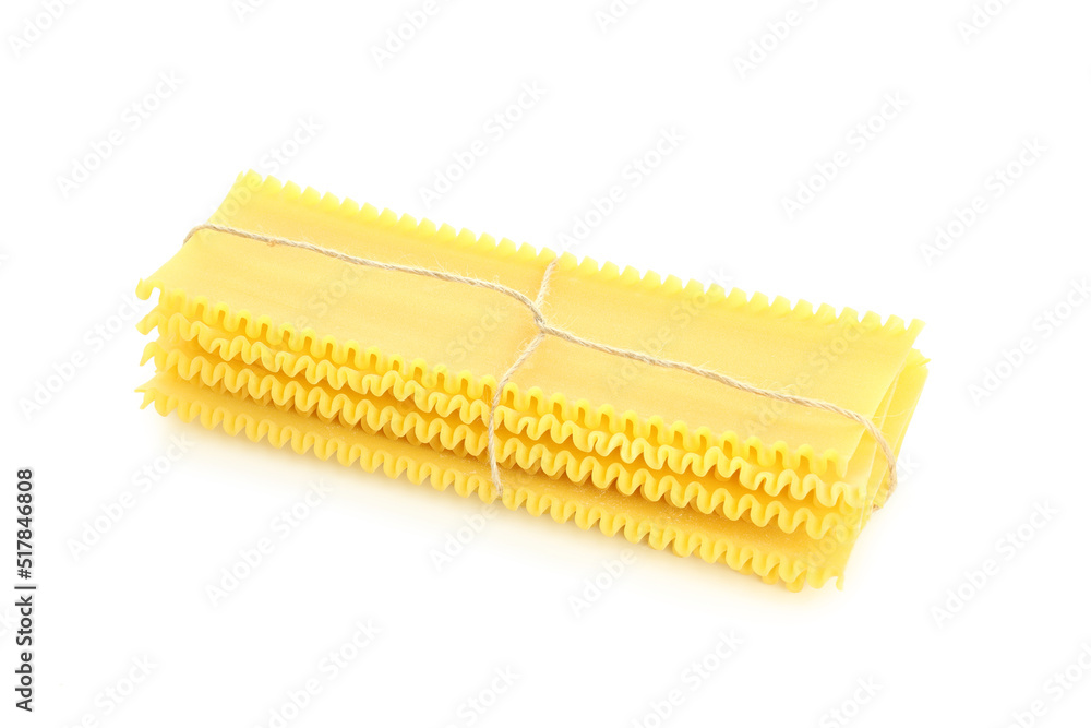Uncooked lasagna sheets isolated on white background Uncooked lasagna sheets isolated on white background