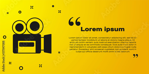 Black Retro cinema camera icon isolated on yellow background. Video camera. Movie sign. Film projector. Vector