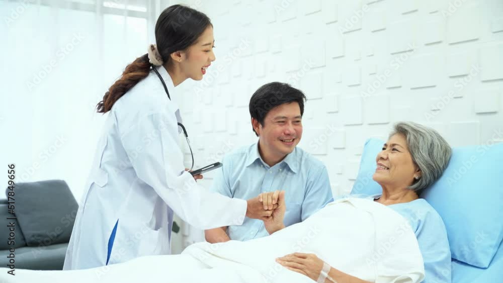 Female doctor came to inform me of better results of treatment. Let the female patient and her son know. Female patient Thanking the female doctor for treating her until her condition improved. Female doctor came to inform me of better results of treatment. Let the female patient and her son know. Female patient Thanking the female doctor for treating her until her condition improved.