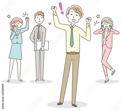 ガッツポーズをする男性と応援する同僚達