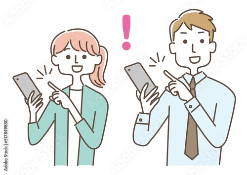 スマートフォンを操作する男女セット