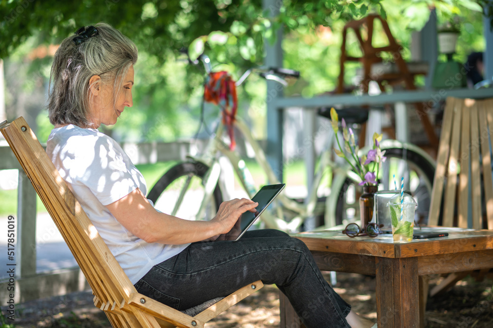 Woman having a video call and looking involved