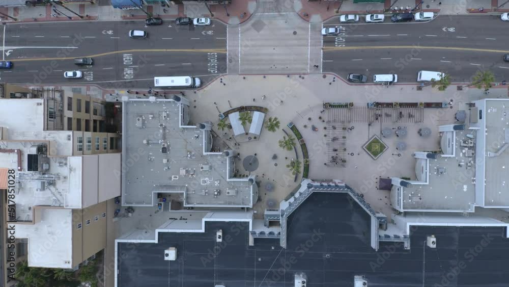Busy Area Near Movie Theater in Oceanside with People Walking and Cars Driving • Descending Aerial Drone Shot Birds Eye Overhead View • Horizontal HD • San Diego California USA Busy Area Near Movie Theater in Oceanside with People Walking and Cars Driving • Descending Aerial Drone Shot Birds Eye Overhead View • Horizontal HD • San Diego California USA