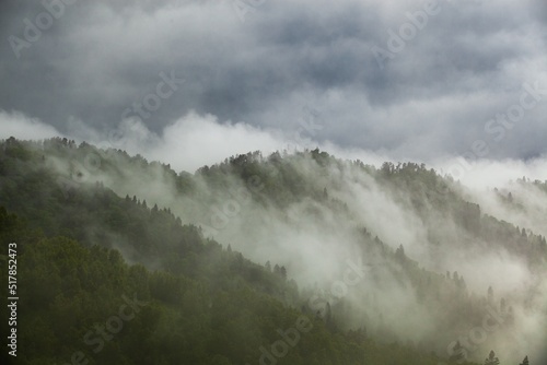 Cloud formation in amazon rainforest during monsoon wet season woods on a mountain . Fog concept.