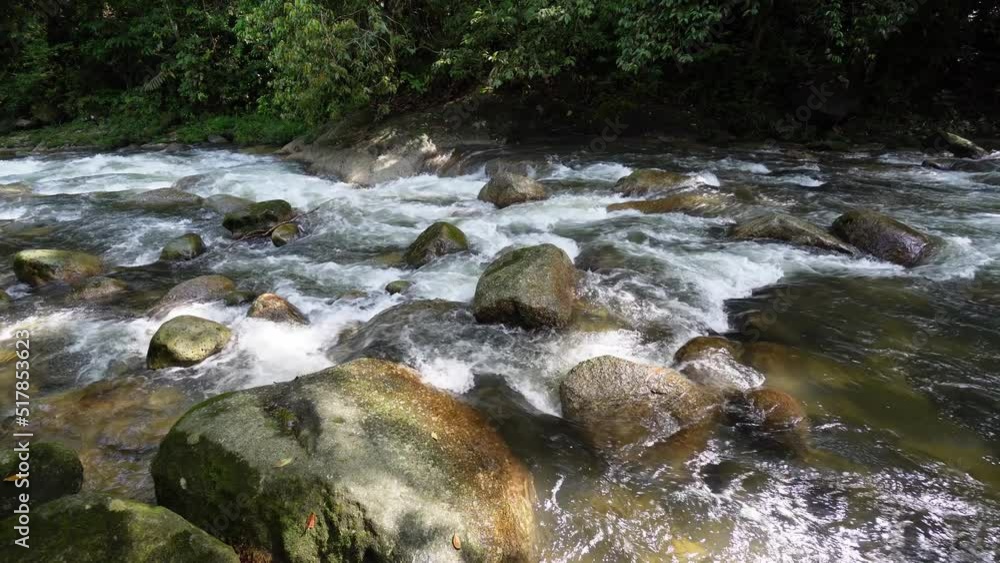 Stream flow through rock in forest Sungai Sedim, Kedah Stream flow through rock in forest Sungai Sedim, Kedah
