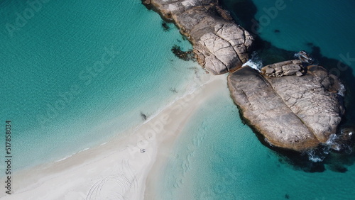 Aerial picture of two beaches in south-west Australia. Island landscape with clear blue water in Wylie Bay, Esperance, Western Australia. Rocks, sand, beach and ocean view from above.  photo