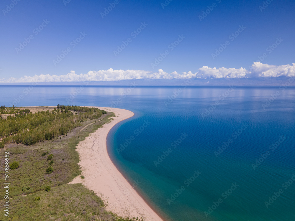Top view of the sandy beach and Issyk-Kul lake Top view of the sandy beach and Issyk-Kul lake