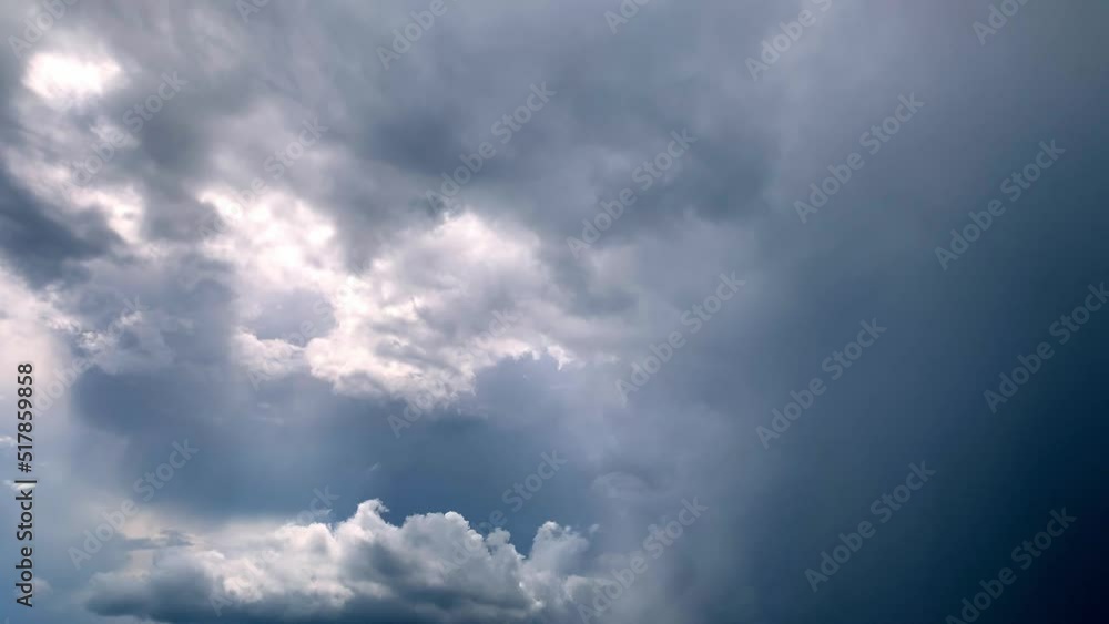 Dark sky with clouds over the city. Storm rain and hail are approaching. Dark sky with clouds over the city. Storm rain and hail are approaching.