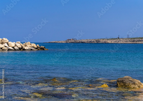 Seashore with blue water, North Governorate, Anfeh, Lebanon photo