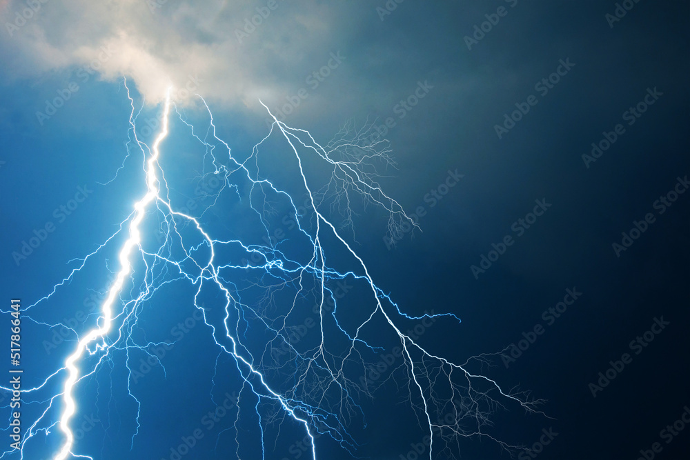 Fork lightning striking down during summer storm Fork lightning striking down during summer storm