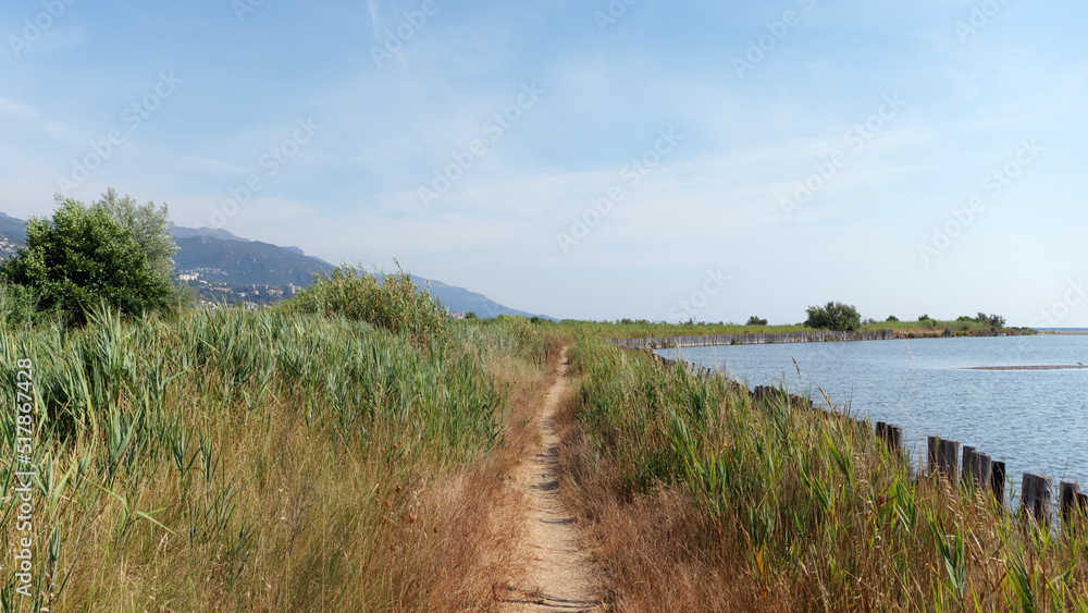 path along the Biguglia lagoon in eastern coast of Corsica island