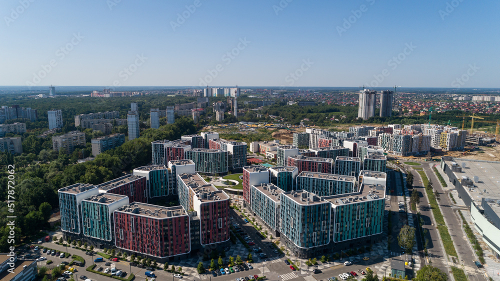 Fototapeta premium Drone aerial view modern building Residential complex Respublika. Construction of residential premises. Kyiv capital of Ukraine