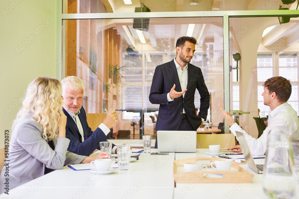 Consulting man discusses with start-up business team Consulting man discusses with start-up business team