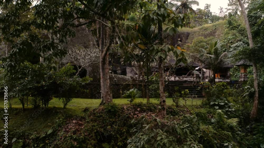 Stunning shrines at Hindu temple in tropical forest of Ubud, Bali; aerial Stunning shrines at Hindu temple in tropical forest of Ubud, Bali; aerial