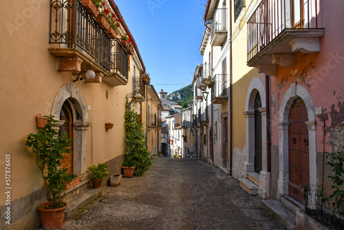 A narrow street between the old stone houses of Cansano  a medieval village in the Abruzzo region of Italy. 