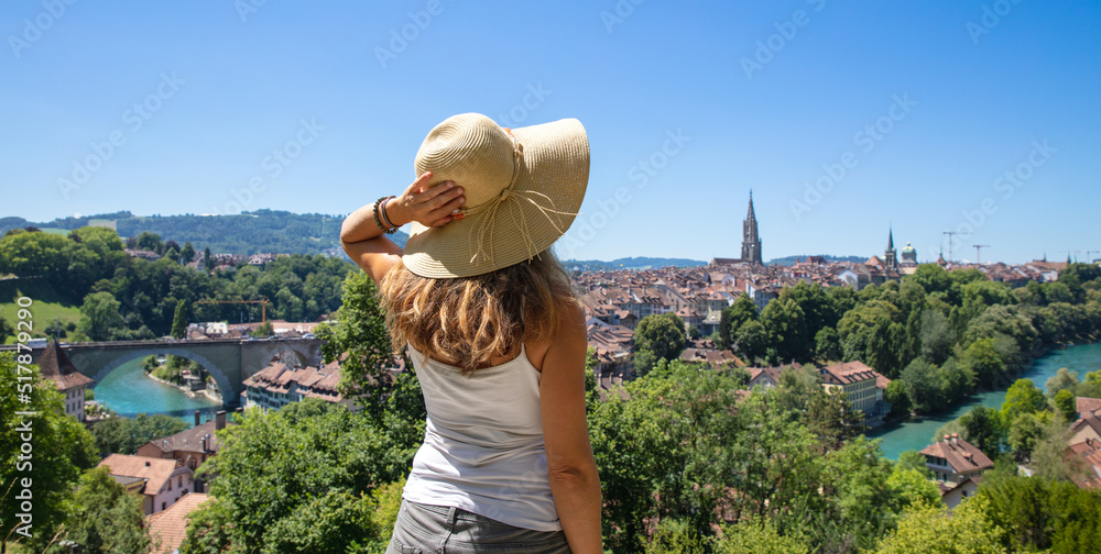 panoramic view of city with traveler woman