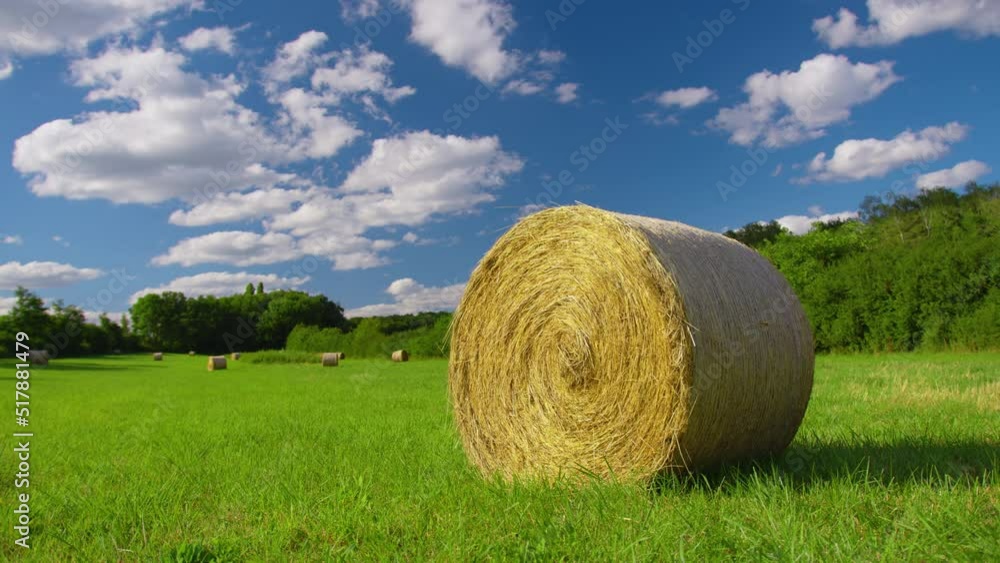 Straw stacks stacked bales of hay left over from harvesting crops, field of an agricultural farm with harvested crops. Landscape of straw bales against clouding sky on background Straw stacks stacked bales of hay left over from harvesting crops, field of an agricultural farm with harvested crops. Landscape of straw bales against clouding sky on background