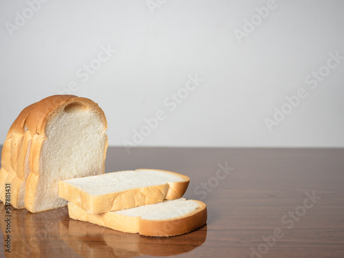 Fotografie, Obraz Fresh slice loaf bread on the table copy space