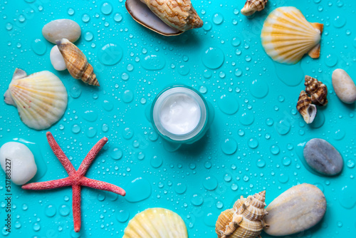 Moisturizing lotion cream on a sea background. Selective focus.