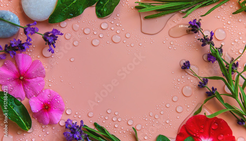 Background with water drops and flowers. Selective focus.