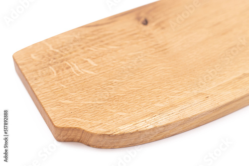 Wooden cutting board isolated above white background