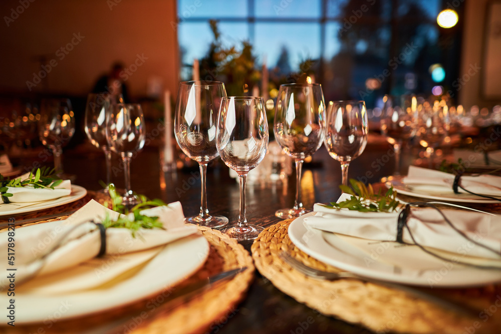 Fototapeta premium Glass goblets on the table. Glass goblets for wine or champagne 